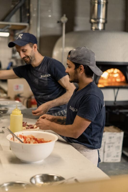 pizzaioli making authentic neapolitan pizza